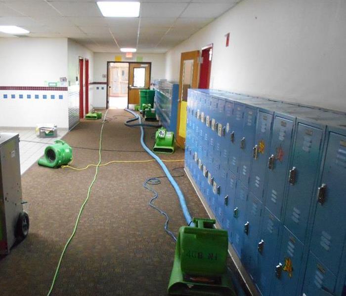 School hallway cleaned after flooding in Dallas