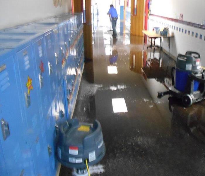 Flooded school hallway in Dallas