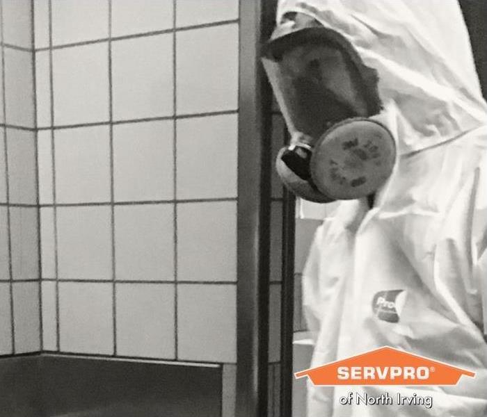 decontamination services in North Irving - image of employee in PPE