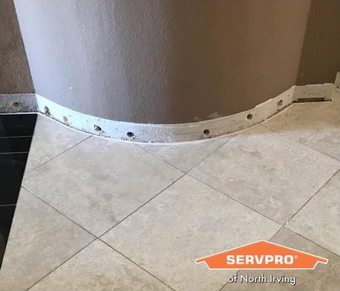 North Irving Baseboard Water Damage Before